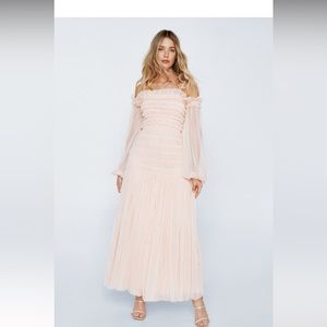 Nasty gal never won’t dress. Still in packaging. Missed my return date